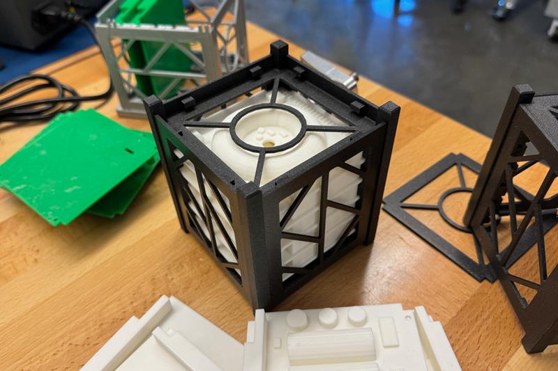 A CubeSat, small modular satellite that can fit in your hand